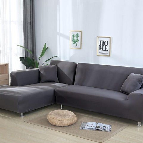 Funda gris para proteger tu sofá o rinconera