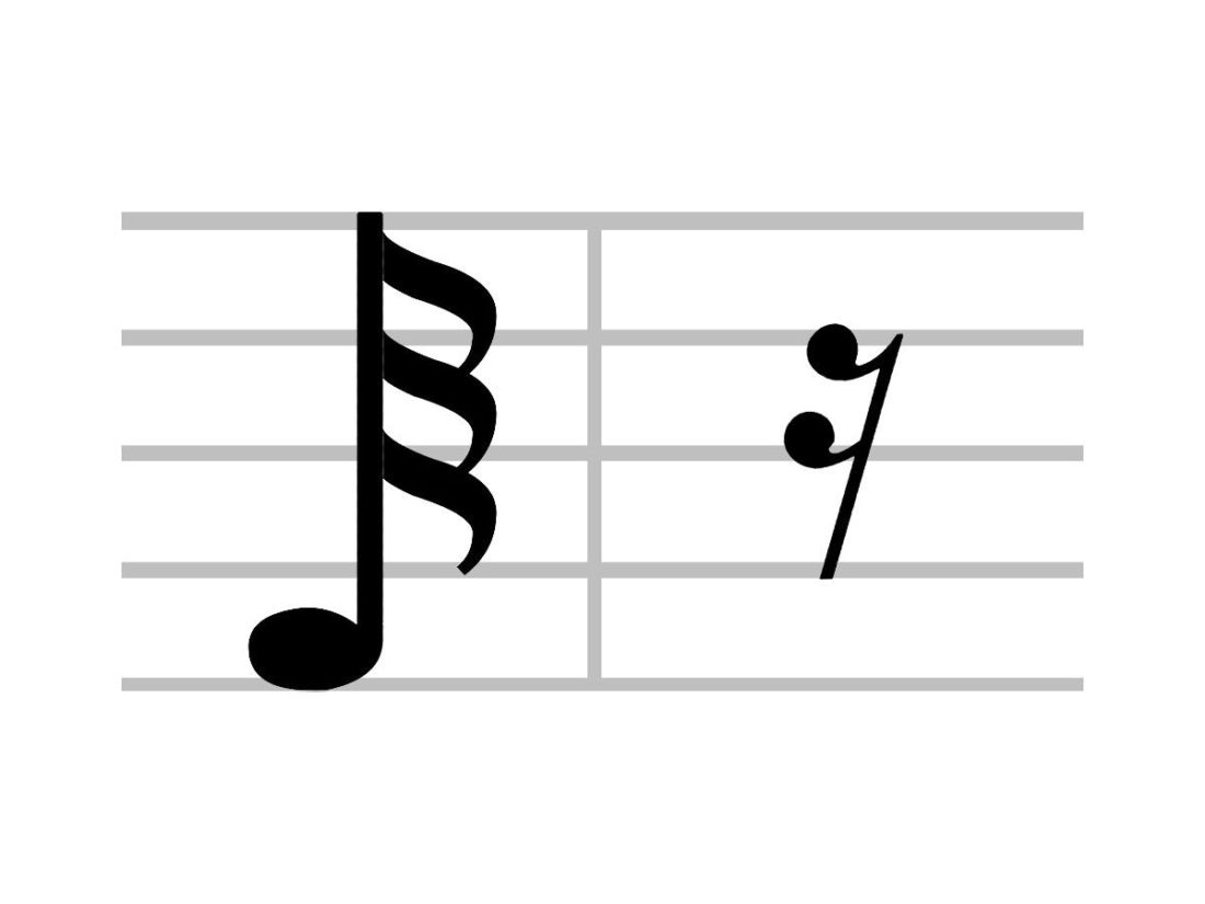 Vista de cerca del símbolo musical demisemiquaver o nota treinta y dos